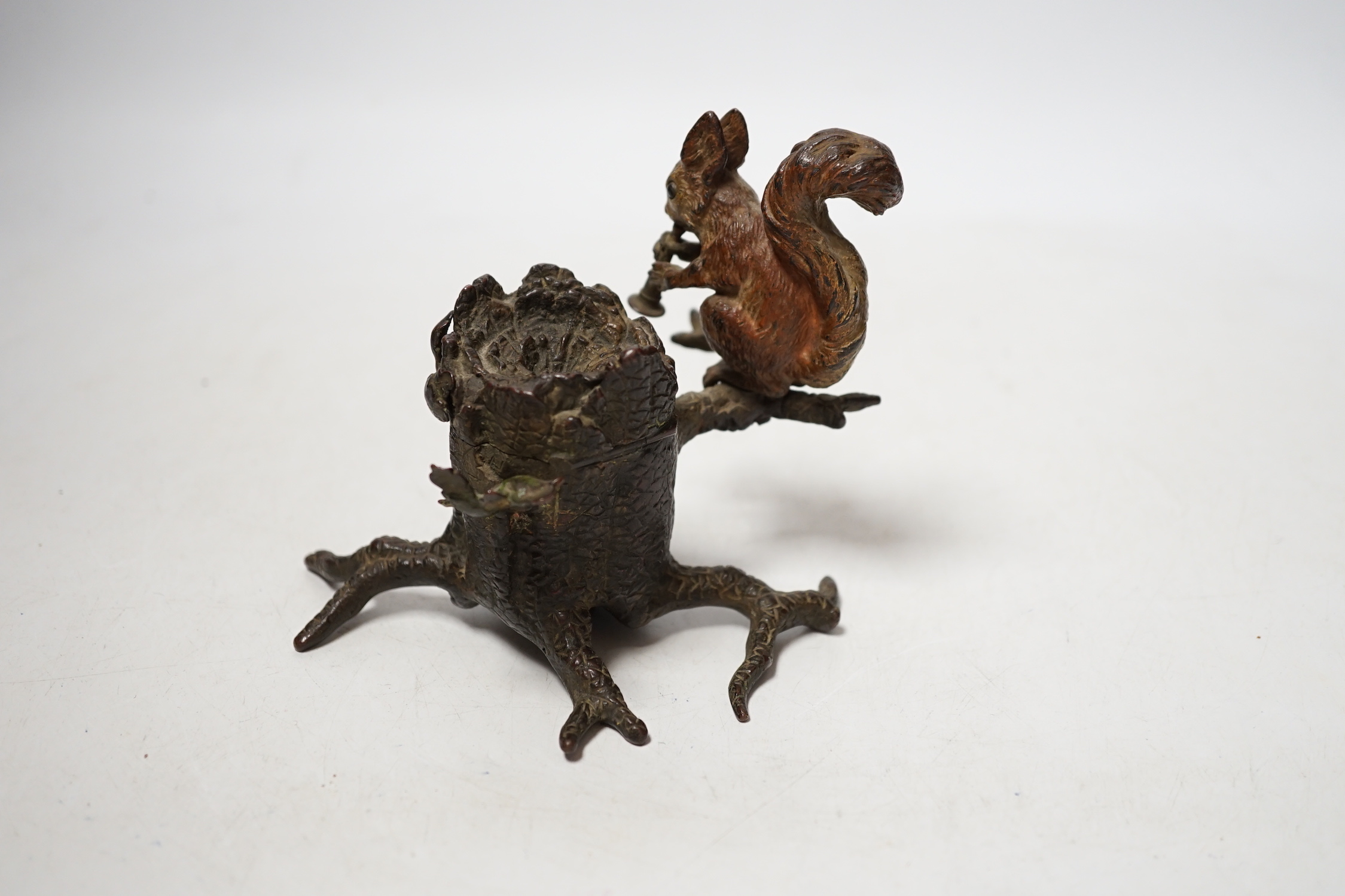 A cold painted bronze inkwell with squirrel, marked ‘Guschutzt’, 10cm